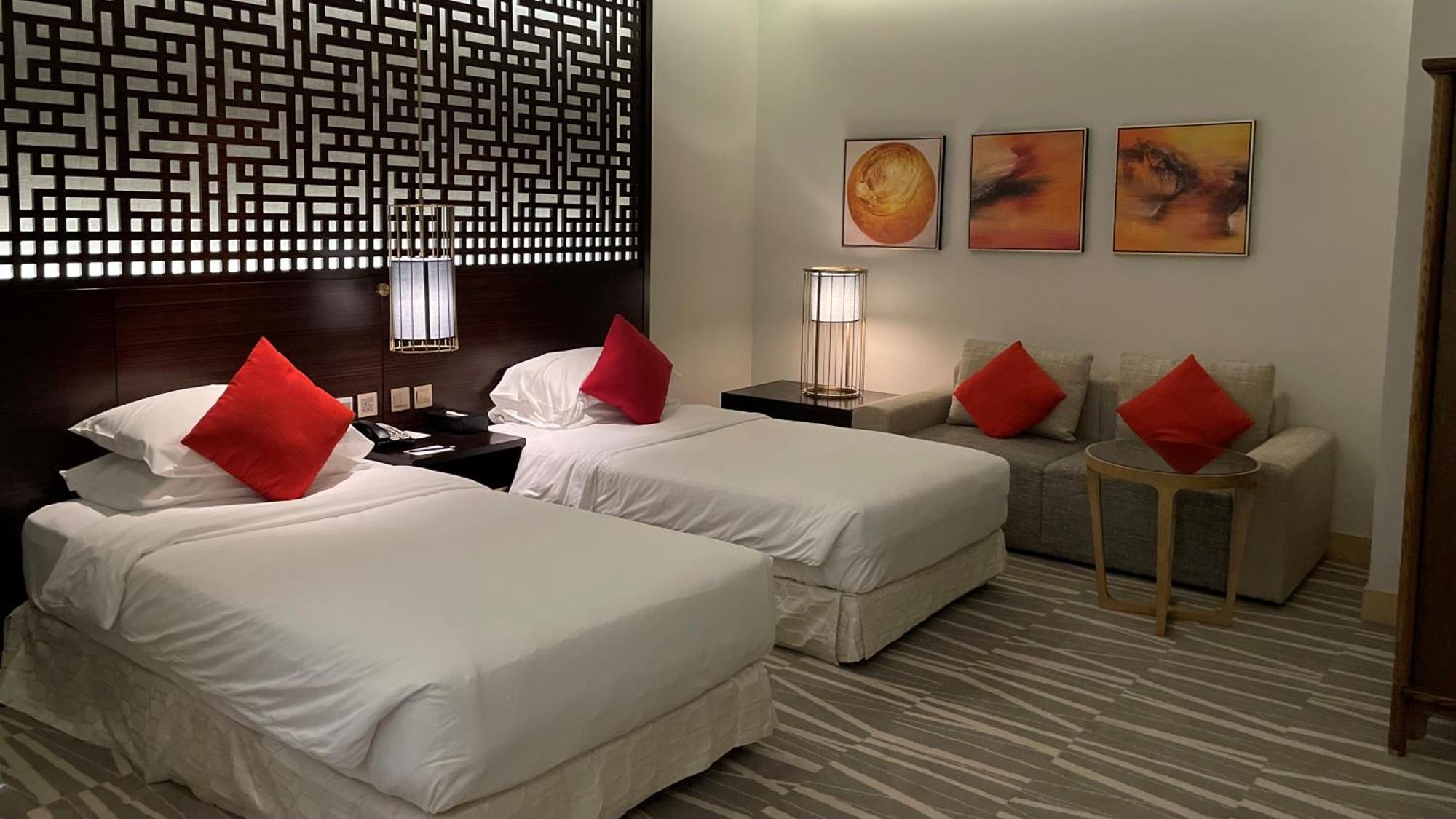 Ramada Hotel & Suites By Wyndham Al Qassim Al Bukayriah Exterior foto A room at the hotel