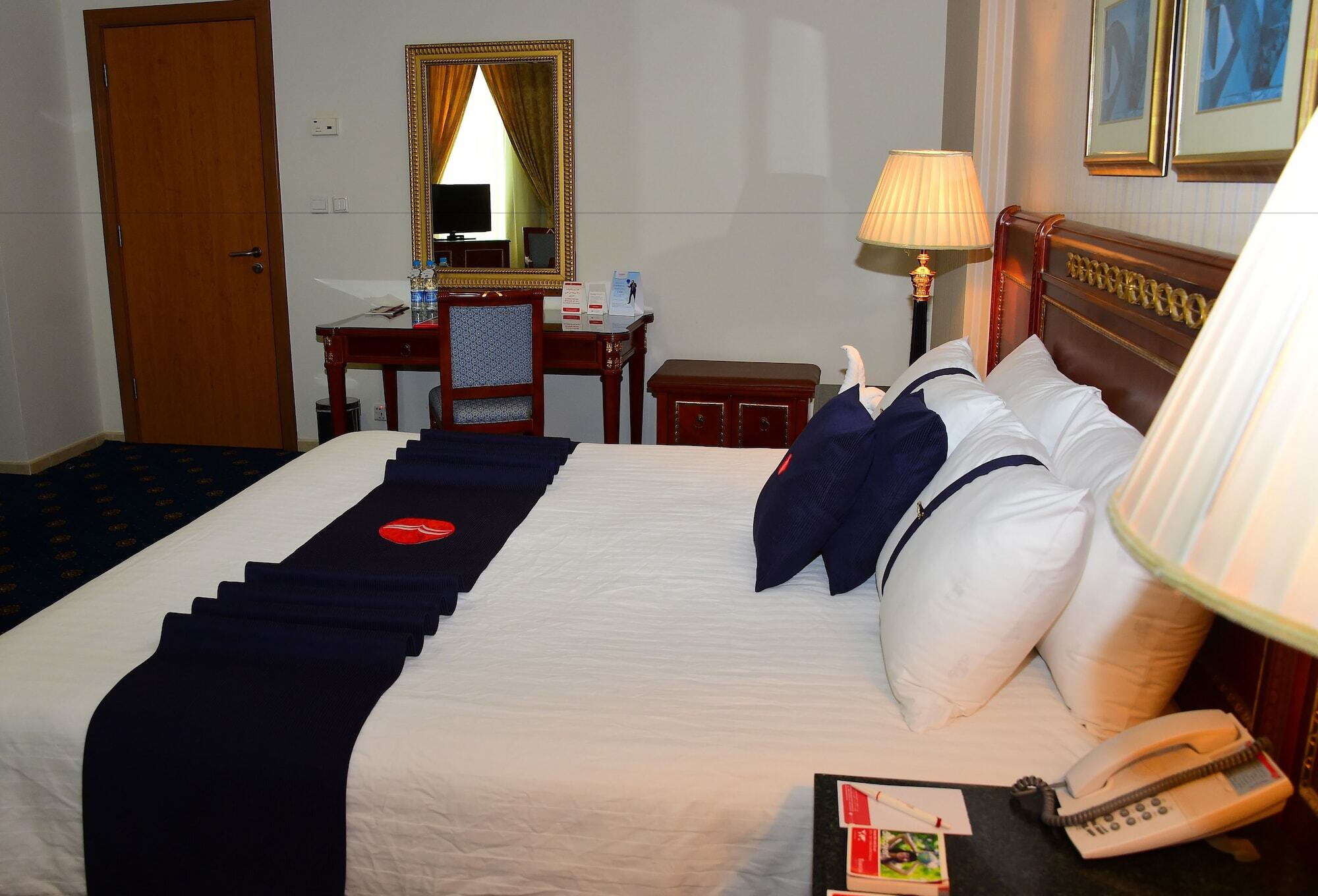 Ramada Hotel & Suites By Wyndham Al Qassim Al Bukayriah Exterior foto A bedroom at the hotel